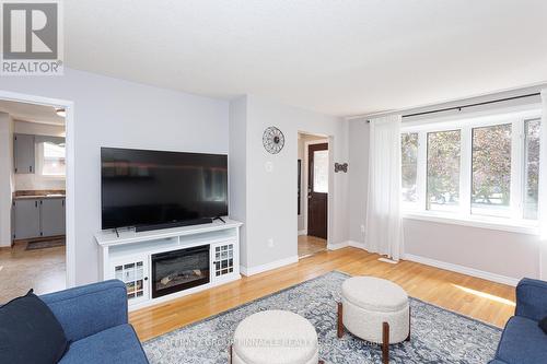 8 Roselyn Court, Kawartha Lakes (Lindsay), ON - Indoor Photo Showing Living Room With Fireplace