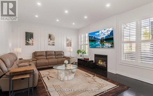 452 Nairn Circle, Milton, ON - Indoor Photo Showing Living Room With Fireplace