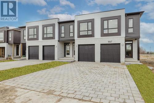 1867 Dalmagarry Road, London, ON - Outdoor With Facade