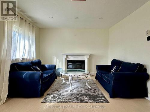 721 Hiawatha Line, Otonabee-South Monaghan, ON - Indoor Photo Showing Living Room With Fireplace