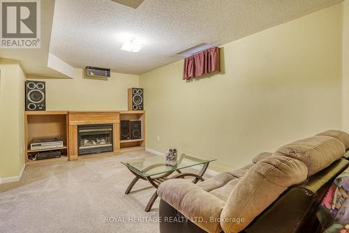 17 Catkins Crescent, Whitby, ON - Indoor With Fireplace