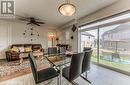 Dining room featuring light hardwood / wood-style floors, a wealth of natural light, a textured ceiling, and ceiling fan - 14 Greyhawk Street, Kitchener, ON  - Indoor 