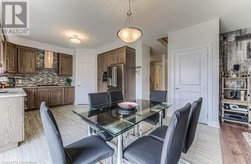 Dining space featuring light hardwood / wood-style flooring - 14 Greyhawk Street, Kitchener, ON - Indoor