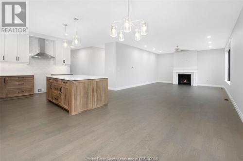 51 Belleview, Kingsville, ON - Indoor Photo Showing Kitchen With Fireplace