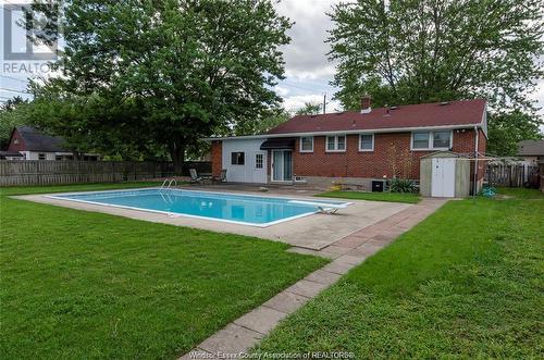 1694 Everts Avenue, Windsor, ON - Outdoor With In Ground Pool With Backyard