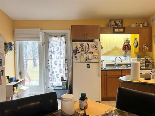 54 Poplar Street, Sidney, MB - Indoor Photo Showing Kitchen With Double Sink