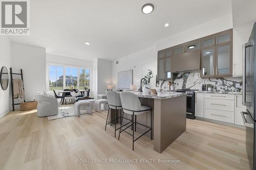 102 - 941 Charles Wilson Parkway, Cobourg, ON - Indoor Photo Showing Kitchen With Upgraded Kitchen