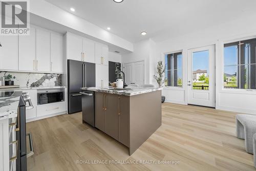 102 - 941 Charles Wilson Parkway, Cobourg, ON - Indoor Photo Showing Kitchen With Upgraded Kitchen