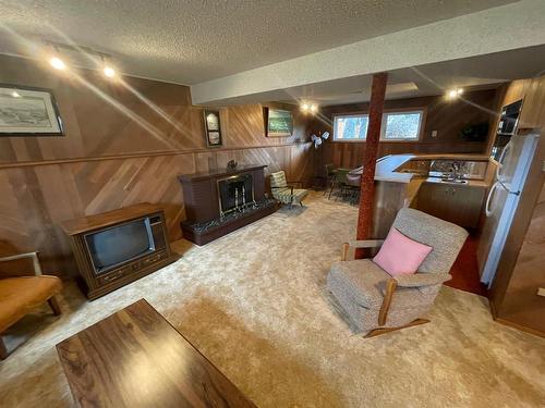 40 Juniper Bay, Brandon, MB - Indoor Photo Showing Other Room With Fireplace