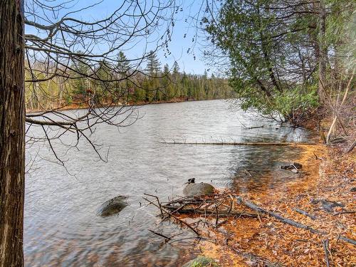 Waterfront - 61 Rue Du Lac-Castor, Sainte-Marguerite-Du-Lac-Masson, QC - Outdoor With Body Of Water With View