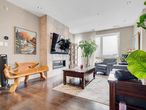 Salon - 601-305 Rue Carmelle-Boutin, Blainville, QC - Indoor Photo Showing Living Room With Fireplace