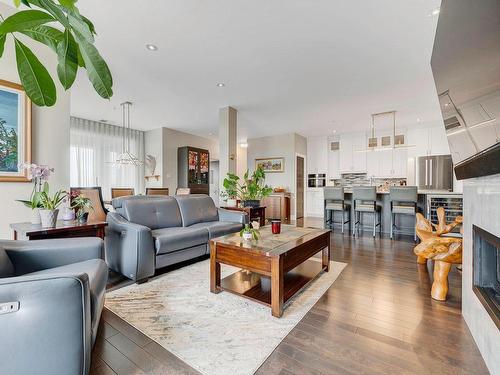 Salon - 601-305 Rue Carmelle-Boutin, Blainville, QC - Indoor Photo Showing Living Room With Fireplace