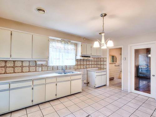 Kitchen - 963 Rue St-Thomas, Laval (Chomedey), QC - Indoor Photo Showing Kitchen With Double Sink