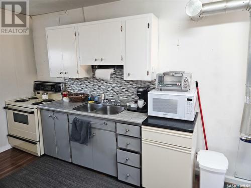 15 First Street, Tompkins, SK - Indoor Photo Showing Kitchen With Double Sink