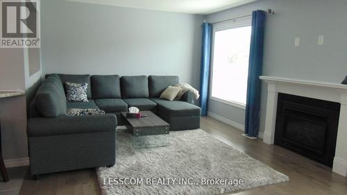 1815 Brown Drive, London, ON - Indoor Photo Showing Living Room With Fireplace