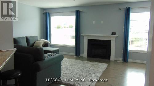 1815 Brown Drive, London, ON - Indoor Photo Showing Living Room With Fireplace