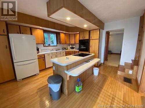 17 Evangeline Street, Saint-Quentin, NB - Indoor Photo Showing Kitchen With Double Sink