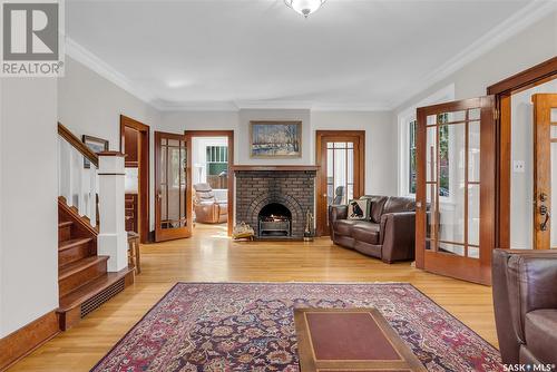 1032 University Drive, Saskatoon, SK - Indoor Photo Showing Living Room With Fireplace