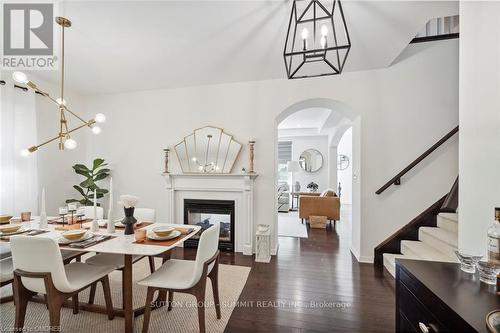 359 Nunn Court, Milton, ON - Indoor Photo Showing Dining Room With Fireplace