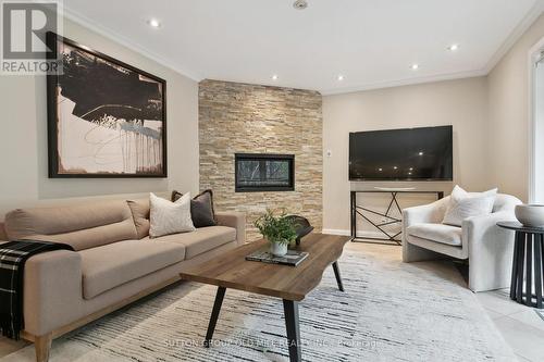 17 Strath Humber Court, Toronto, ON - Indoor Photo Showing Living Room With Fireplace