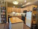 16310 Woolgar Road Unit# 222, Crawford Bay, BC  - Indoor Photo Showing Kitchen With Double Sink 