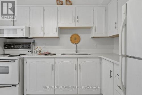 638 - 50 Richmond Street E, Oshawa, ON - Indoor Photo Showing Kitchen With Double Sink