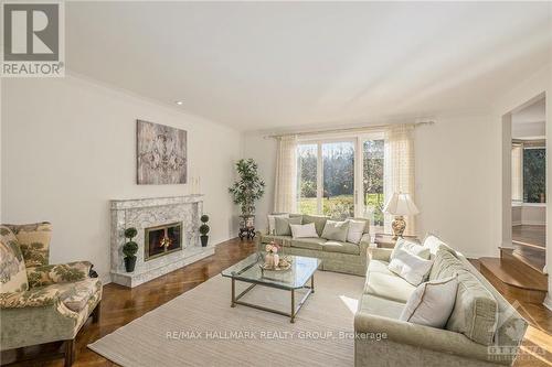 4 Timbercrest Ridge, Ottawa, ON - Indoor Photo Showing Living Room With Fireplace