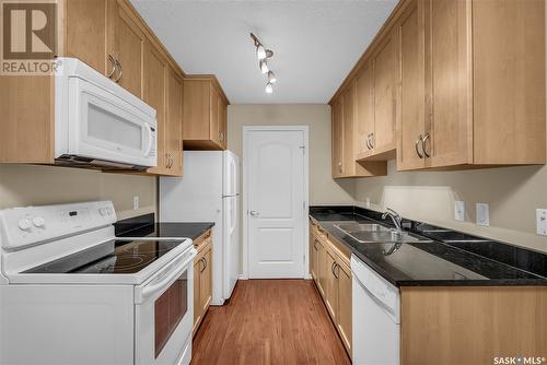 104F 1121 Mckercher Drive, Saskatoon, SK - Indoor Photo Showing Kitchen With Double Sink