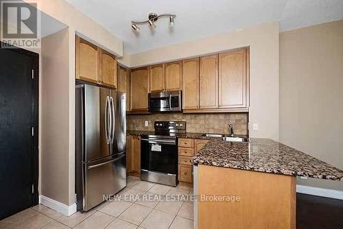 2002 - 80 Absolute Avenue, Mississauga, ON - Indoor Photo Showing Kitchen