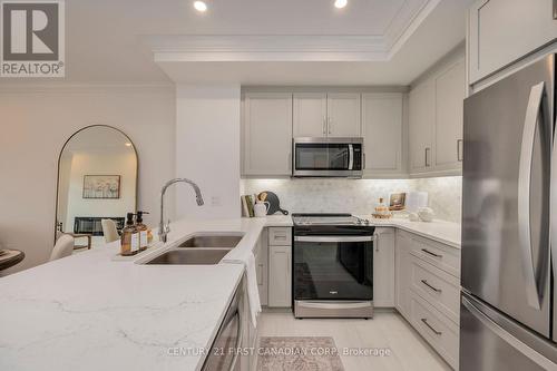 314 - 1560 Upper West Avenue, London, ON - Indoor Photo Showing Kitchen With Stainless Steel Kitchen With Double Sink With Upgraded Kitchen