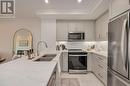 314 - 1560 Upper West Avenue, London, ON  - Indoor Photo Showing Kitchen With Stainless Steel Kitchen With Double Sink With Upgraded Kitchen 