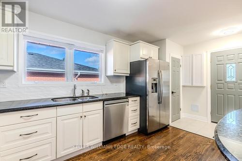 242 West 18Th Street, Hamilton, ON - Indoor Photo Showing Kitchen With Stainless Steel Kitchen With Double Sink