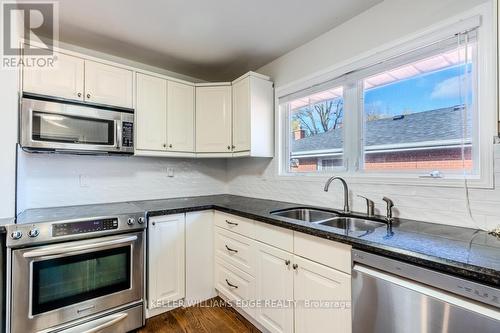 242 West 18Th Street, Hamilton, ON - Indoor Photo Showing Kitchen With Stainless Steel Kitchen With Double Sink