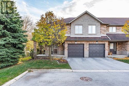 9 - 18 Cedar Street, Grimsby, ON - Outdoor With Facade