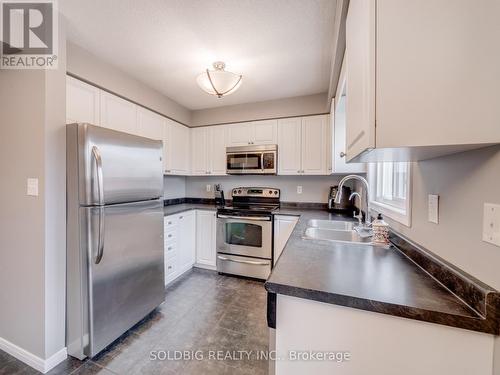 56 - 750 Lawrence Street, Cambridge, ON - Indoor Photo Showing Kitchen With Double Sink