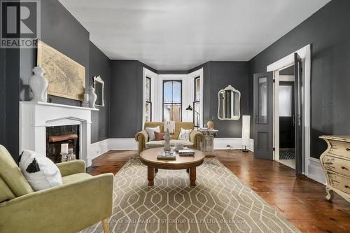 57 King Street E, Cramahe, ON - Indoor Photo Showing Living Room With Fireplace