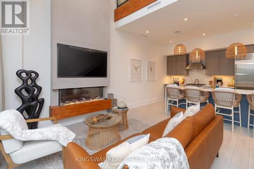 3782 Ferretti Court, Innisfil, ON - Indoor Photo Showing Living Room With Fireplace