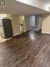 Unfurnished living room with dark hardwood / wood-style floors - 111 Dallan Drive, Guelph, ON  - Indoor Photo Showing Other Room 