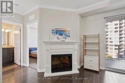 1210 - 330 Ridout Street N, London, ON - Indoor Photo Showing Living Room With Fireplace