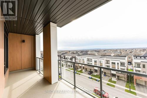 504 - 1440 Clarriage Court, Milton, ON - Outdoor With Balcony With View With Exterior