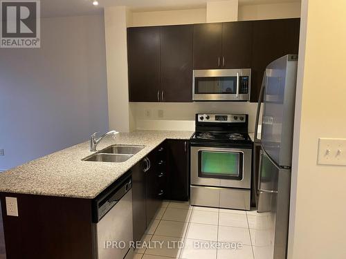 420 - 383 Main Street W, Milton, ON - Indoor Photo Showing Kitchen With Stainless Steel Kitchen With Double Sink