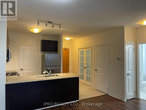 420 - 383 Main Street W, Milton, ON - Indoor Photo Showing Kitchen With Double Sink