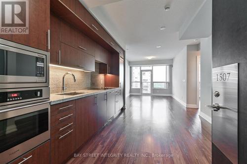 1507 - 2 Anndale Drive, Toronto, ON - Indoor Photo Showing Kitchen With Upgraded Kitchen