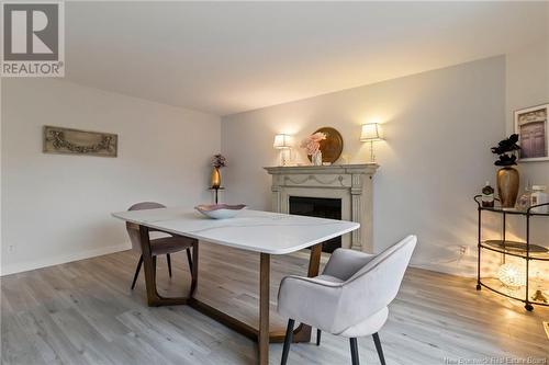 132 Second Avenue, Shediac, NB - Indoor Photo Showing Dining Room With Fireplace