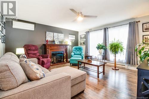 21 Katie Avenue, Douglas, NB - Indoor Photo Showing Living Room With Fireplace