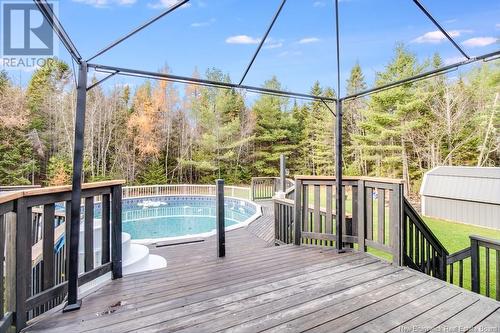 21 Katie Avenue, Douglas, NB - Outdoor With Above Ground Pool With Deck Patio Veranda With Exterior