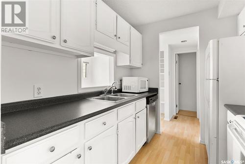 5106 10Th Avenue, Regina, SK - Indoor Photo Showing Kitchen With Double Sink