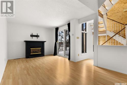 5106 10Th Avenue, Regina, SK - Indoor Photo Showing Living Room With Fireplace