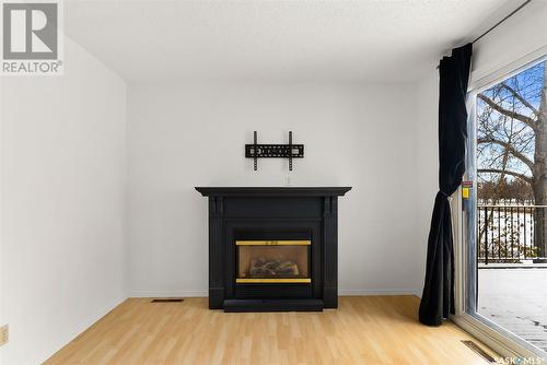 5106 10Th Avenue, Regina, SK - Indoor Photo Showing Living Room With Fireplace