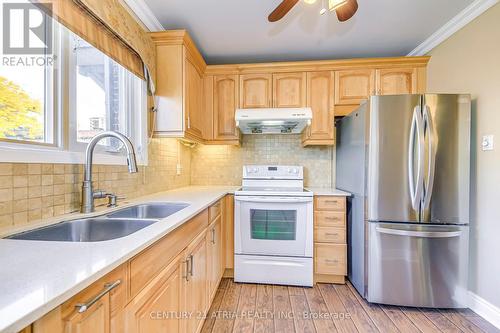 51 - 331 Trudelle Street, Toronto, ON - Indoor Photo Showing Kitchen With Double Sink